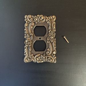Vintage metal outlet cover